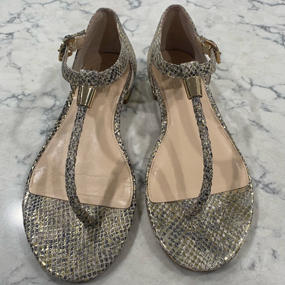 Vince Camuto metallic silver snakeskin print leather T-strap flat sandals.